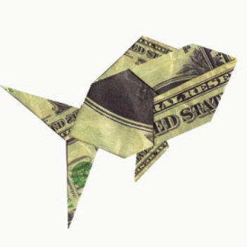 An origami fish made out of dollar bills.