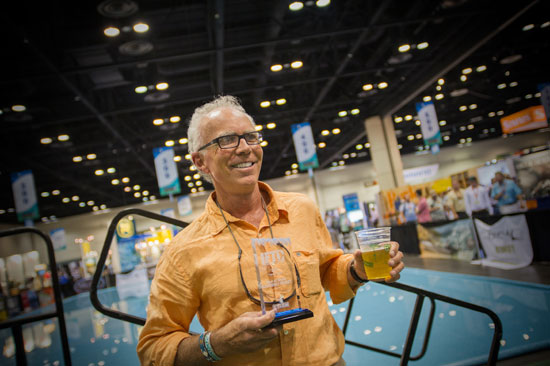 Johhny Le Coq of fishpond is all smiles after winning Best Eco-Friendly Product for IFTD 2014