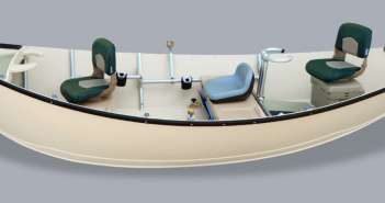 A boat with two seats and a steering wheel.