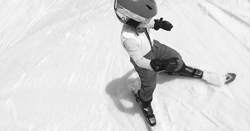A person is skiing down a snowy slope.