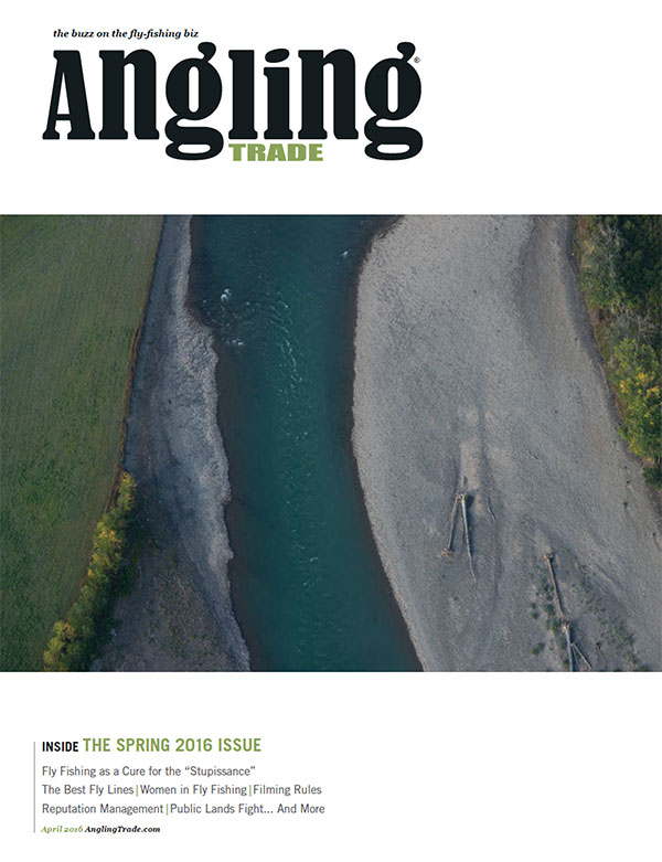 The cover of angling magazine with a river in the background.