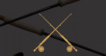 Two fly rods on a black background.