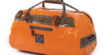 An orange duffel bag with a handle on it.