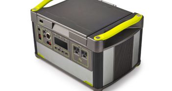 A small box with a yellow handle on it.