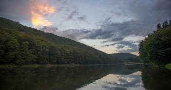 A river is reflected in a body of water.