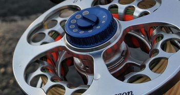 A fly reel on a bike with a spool of spools.