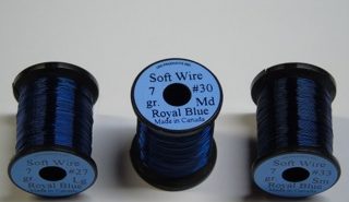 Three spools of blue soft wire.