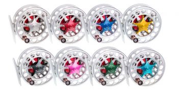 A group of colorful fly reels on a white background.