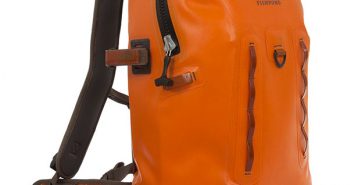 A large orange backpack with a strap on the side.