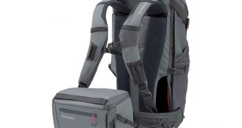A gray backpack with a cooler attached to it.