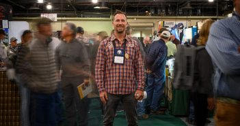 A man standing in front of a crowd of people.