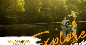 Two people on a boat in a river with the words explore the amazon.