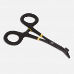 A pair of black and yellow scissors on a white surface.