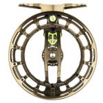 A gold fly reel with a green handle.