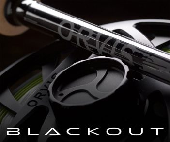 A fly reel with the words blackout on it.