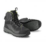 A pair of black and green hiking boots on a white background.
