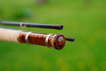 A close up of a wooden fly rod.