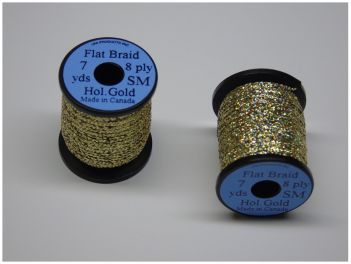 Two spools of gold glitter thread.