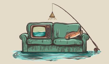 A green couch with a fishing rod and a fish on it.