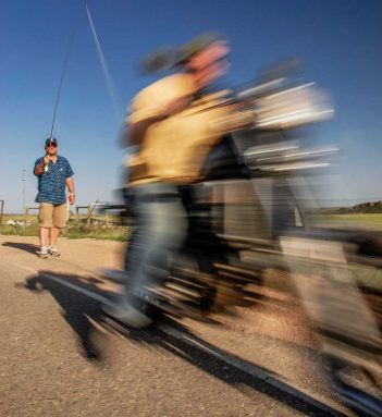 A man riding a motorcycle.