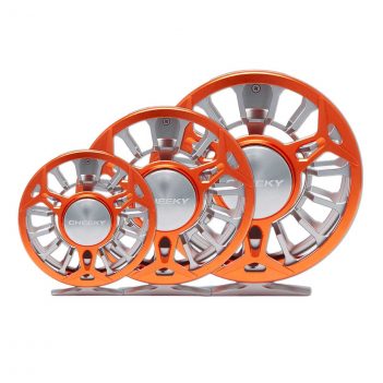 Three orange and silver fly reels on a white background.