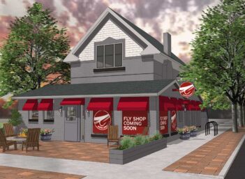 A rendering of a restaurant with a red awning.