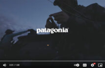 A person in a hooded jacket adjusts gear on a vehicle at dusk with the patagonia logo prominently displayed onscreen.