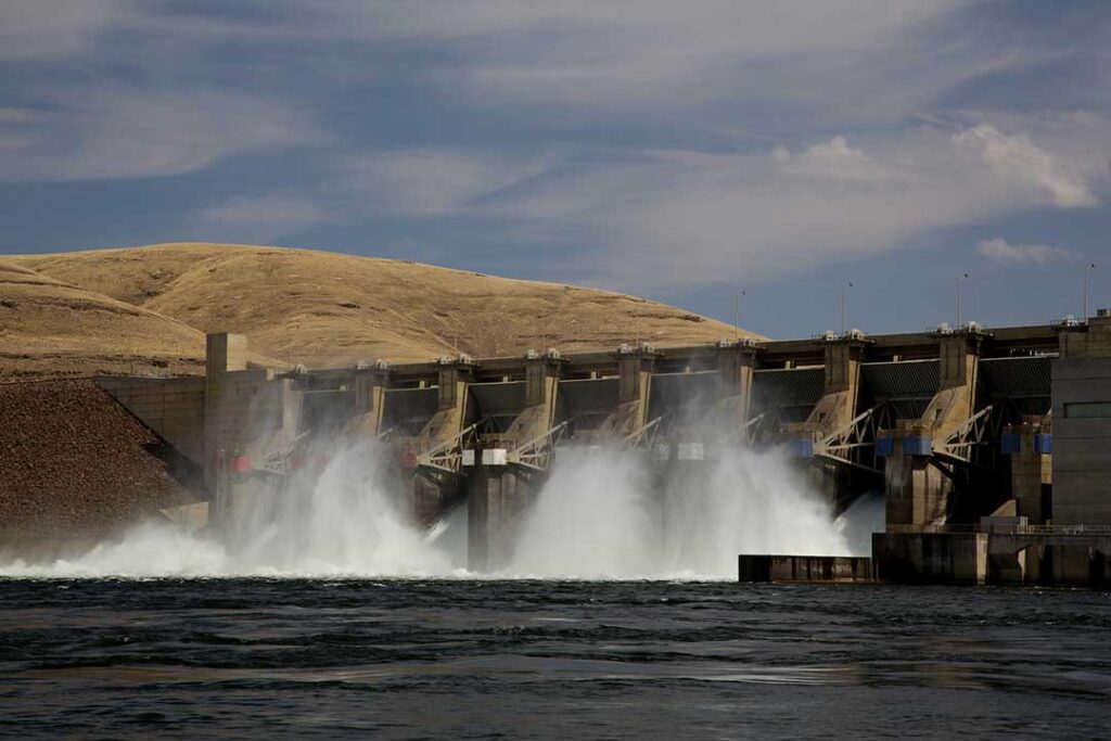 Water being released from the spillways of a hydroelectric dam.