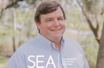A man in a blue checked shirt smiling outdoors with a logo and text "sea sustainability excellence associate" overlaying the image.