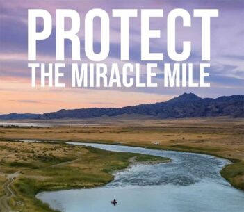 A river winds through a grassy plain at sunset with mountains in the background; large text reads "PROTECT THE MIRACLE MILE.